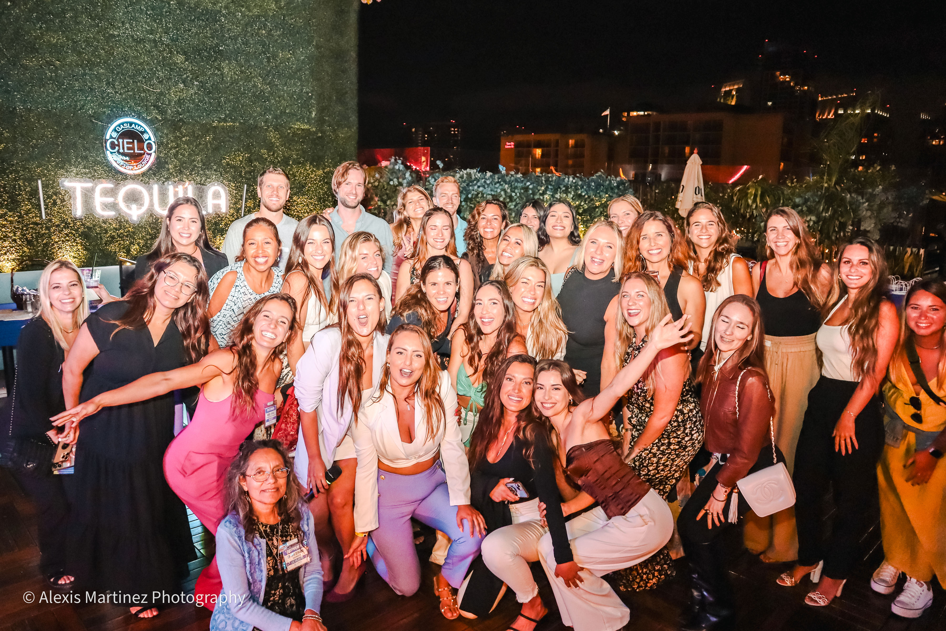Audience at PowerFuel Damas rooftop event — San Diego Gaslamp